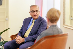 Dean in conversation with guest